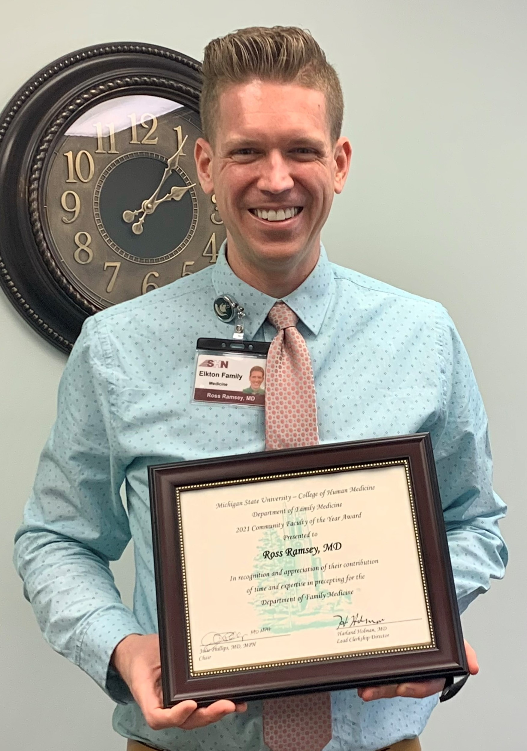 Dr. Ross Ramsey receiving the Mid-Michigan Family Medicine Preceptor of the Year award